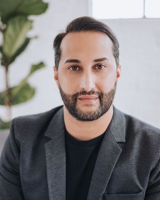 Mohamed Rawoot, Clinical Psychologist in Cape Town, offering mental health support and therapy.